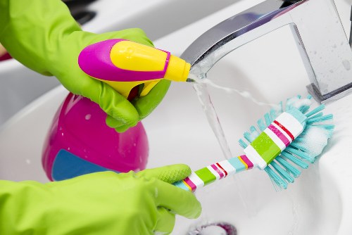 Cleaner using safe carpet cleaning equipment in a home