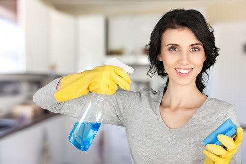 Technician using protective gear during carpet cleaning